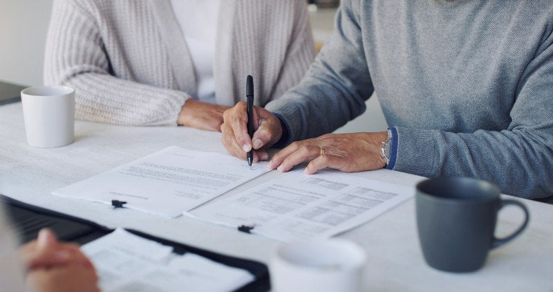 Couple Signing Their Last Will and Testament with a Lawyer in Tracy, CA