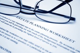 Glasses over a document, showing estate planning terminology in Tracy, CA