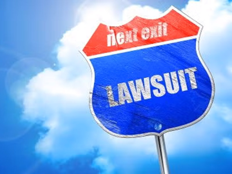 Caution sign and a warning about carbon monoxide poisoning lawsuits in Tracy, CA