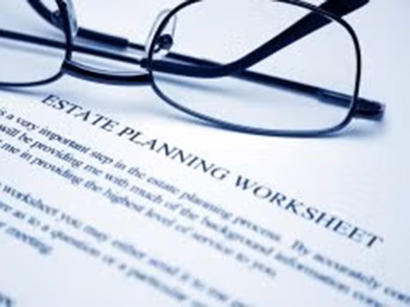 Glasses over a document, showing estate planning terminology in Tracy, CA