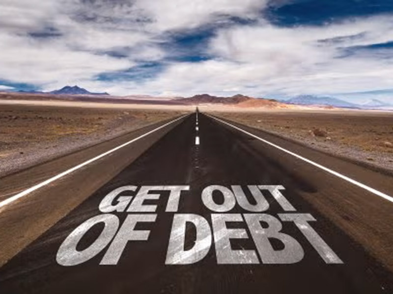 Long Road with 'Debt' written, suggesting estate planning for debt resolution in Tracy, CA